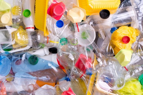 Professional rubbish removal team handling furniture